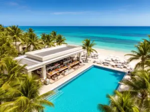 Widok na resort all inclusive z basenem i plażą - ilustracja do artykułu all inclusive co to znaczy